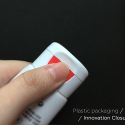 Easy push and pop open PP closure for packaging tubes